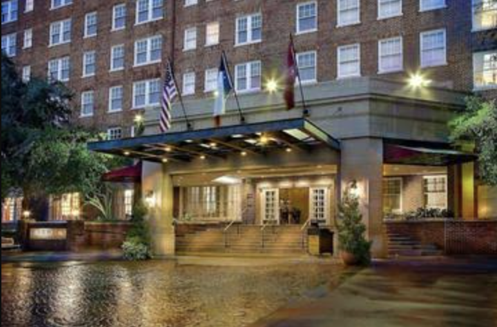 The Warwick Melrose Dallas exterior entrance in the evening